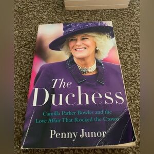 Paperback. Camilla and the love affair that rocked the crown. P.Junor.